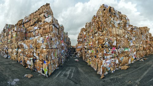 Organised commercial rubbish area with labelled recycling bays